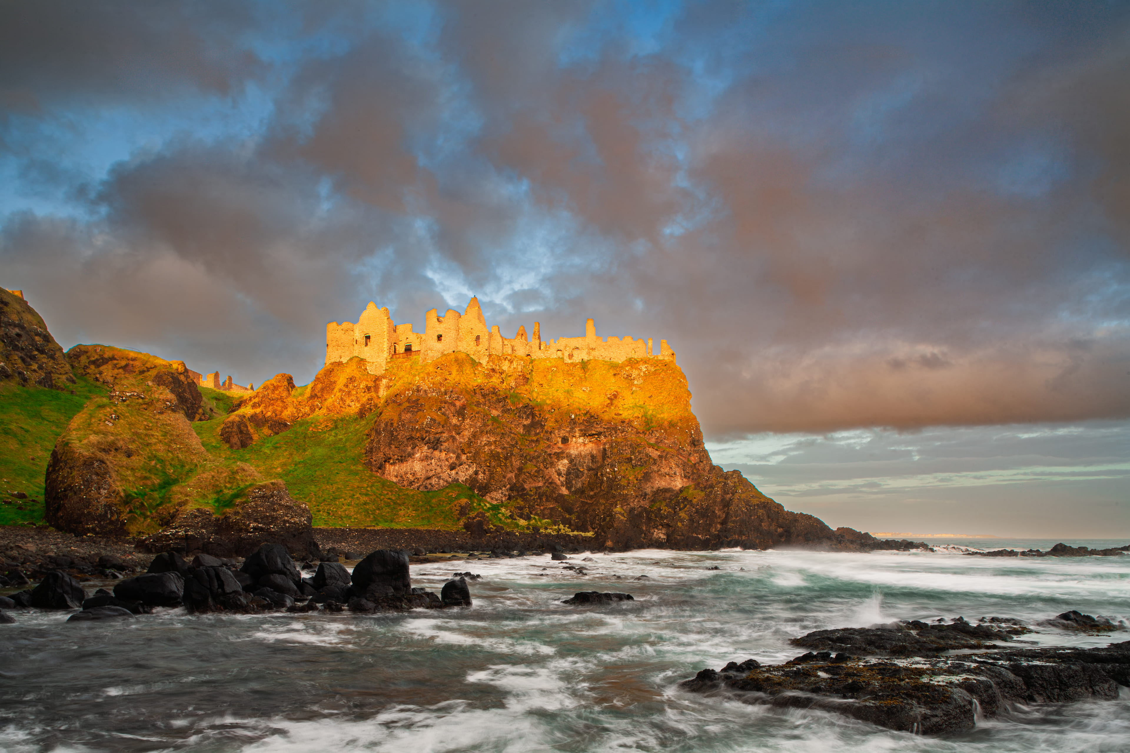 Dunluce Castle at golden hour — Causeway Coast, County Antrim